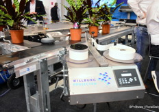 One of the new machines was the Smart Sticker Machine. Using a PLC, the machine callibets itself at the push of a button.